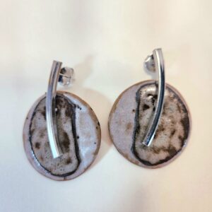 Brincos asinatura da terra.