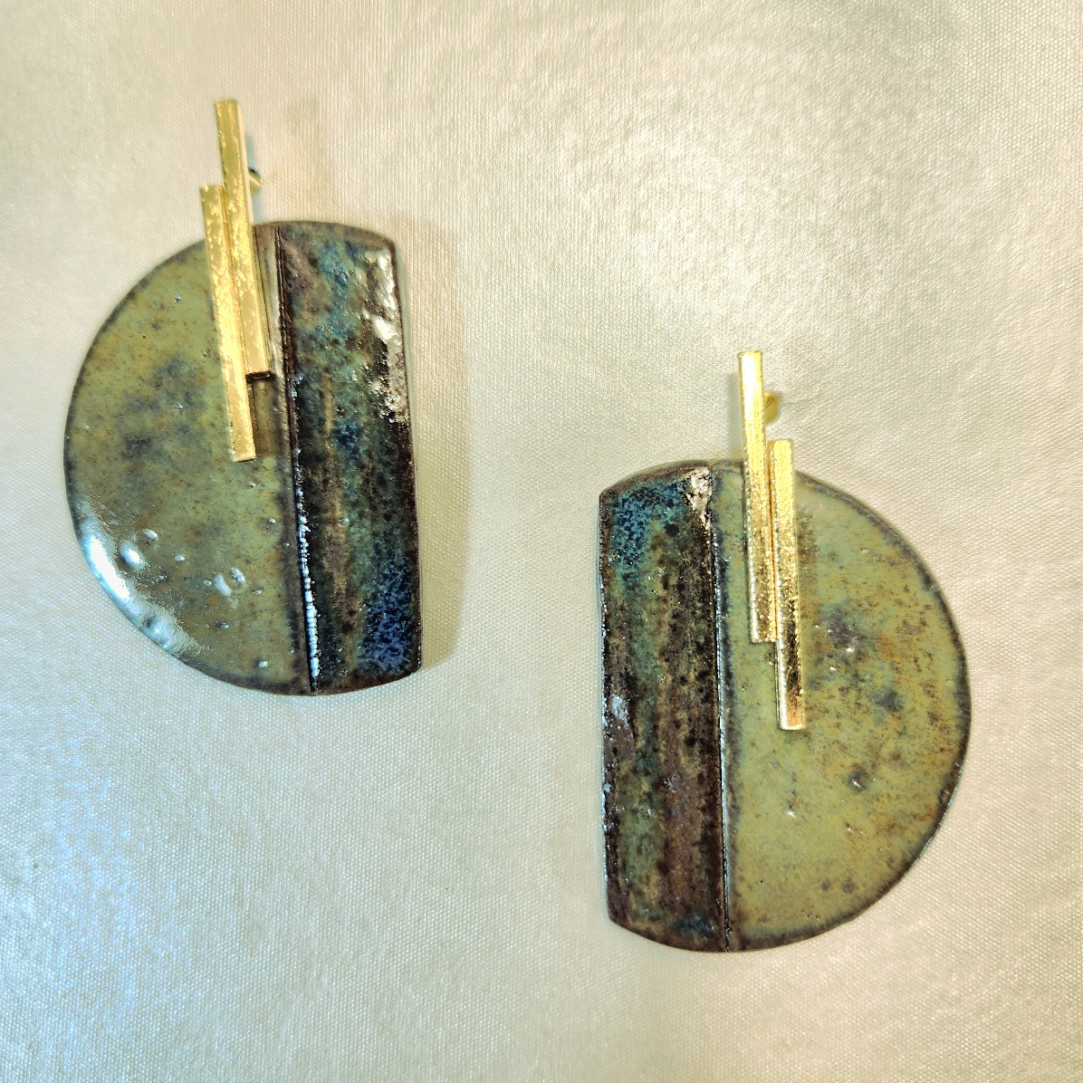 Brincos carinho verde.