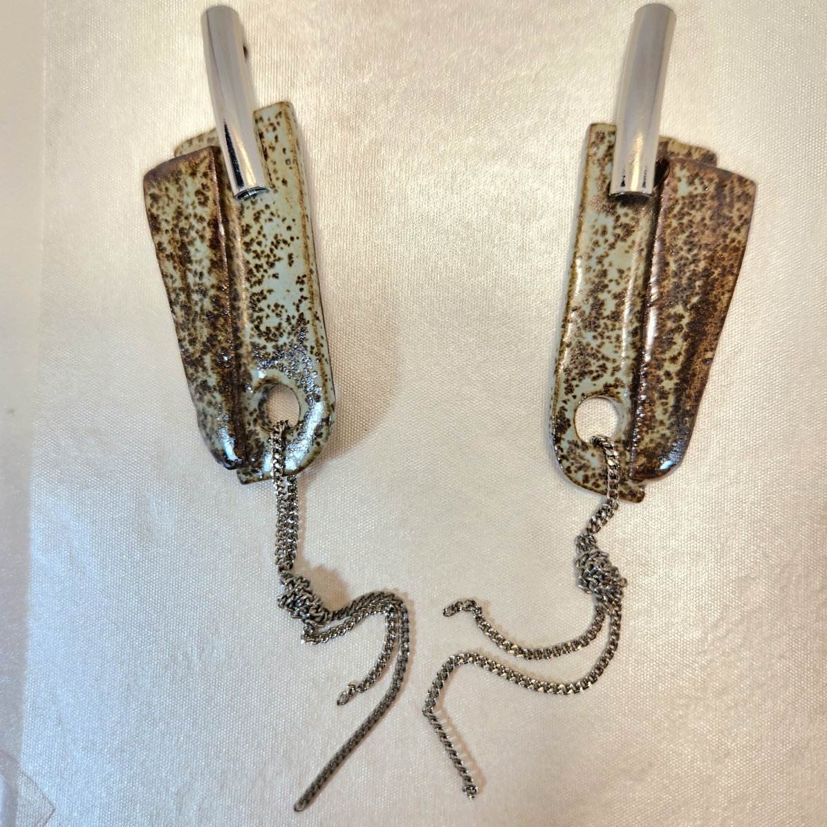 Brincos astro verde.